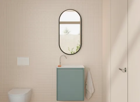 Kleiner Waschtisch aus der Kollektion Oteo des Herstellers burgbad im Gästebad in der Farbe Eisblau softmatt.